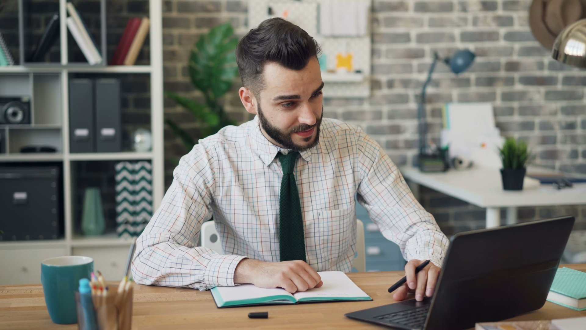 Security+ candidate studying at a desk